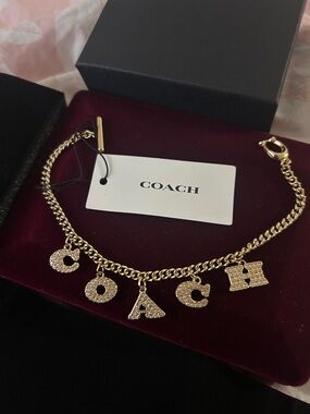 Coach Gold-Tone Crystal Letter Charm Chain Bracelet